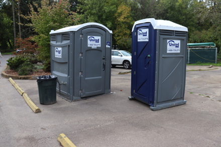 Two porta potties – one ADA accessible – near parking and boat launch